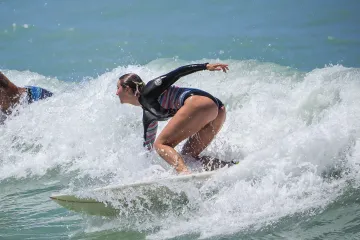 Kylie Surfing at South Jetty