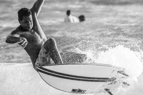 Black and White: Surfer Going Aerial