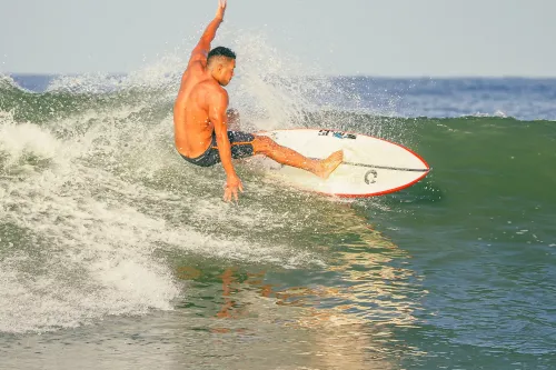 North Jetty, Ida: Surfer Cuts Back