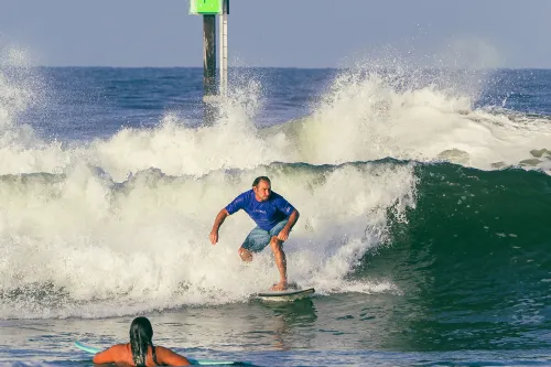 North Jetty, Ida: Catching a Wave in Front of the Marker