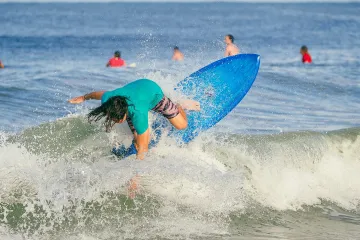 North Jetty, Ida: Blue Surfboard