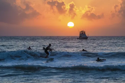 Surfing @ North Jetty with the Setting Sun