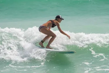 20220522-Girl-Surfing-South-Jetty-Venice