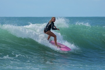 Addy Surfing North Jetty
