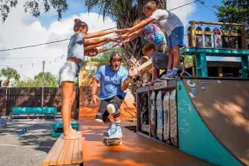 Sarasota, Florida, The 180 House: Tim Skates in a Bridge of 180 Kids